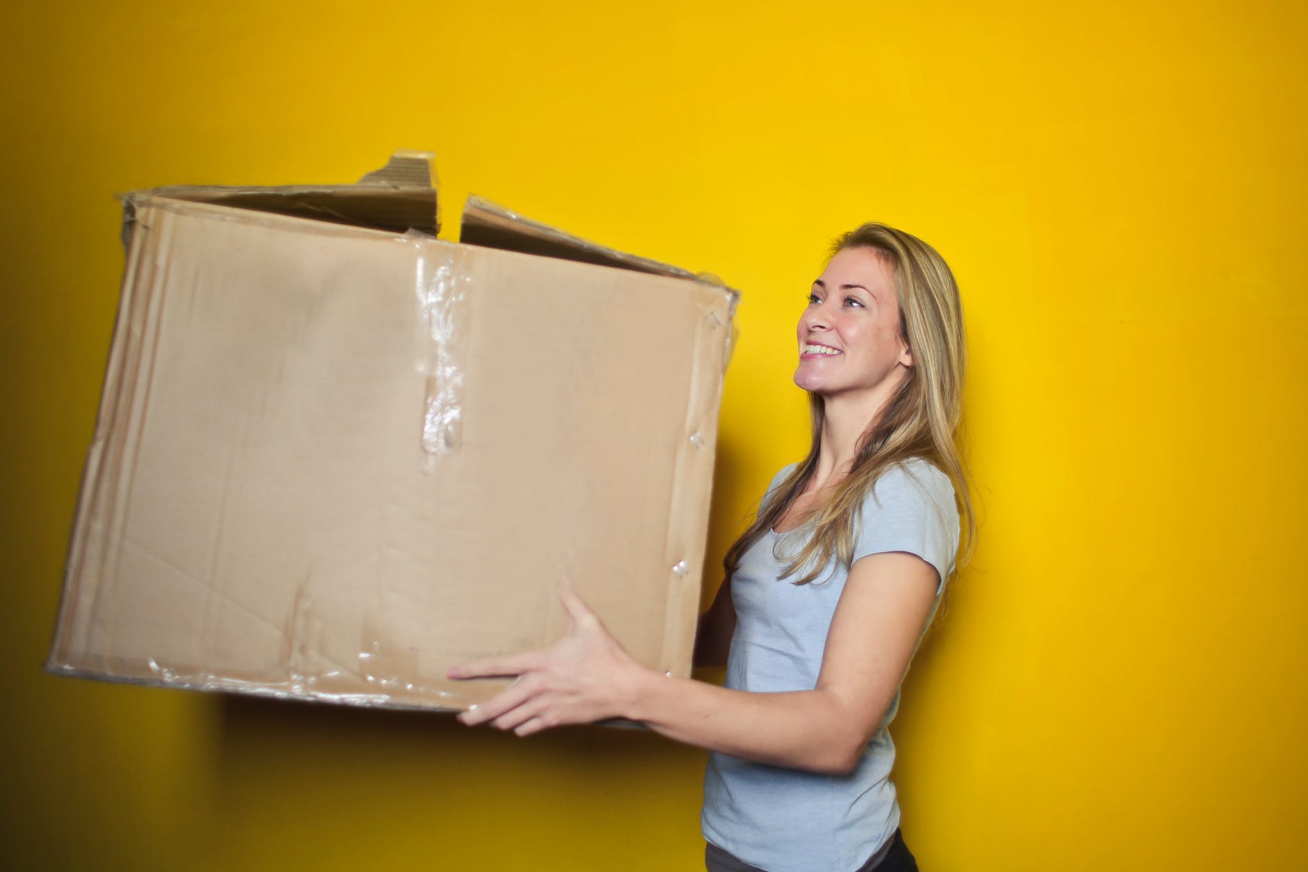 moving - woman with a box